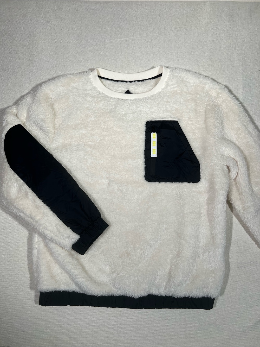 Ugh women’s Cream Sherpa Crewneck Pullover with Black Pocket Accent